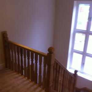 Ash carpet grade, with ash provincial spindles and newels