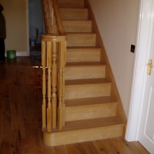 Solid Oak, with oxford fluted spindle